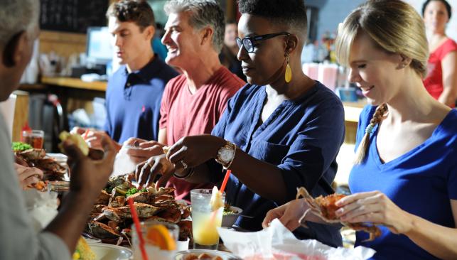 Group Enjoying Seafood