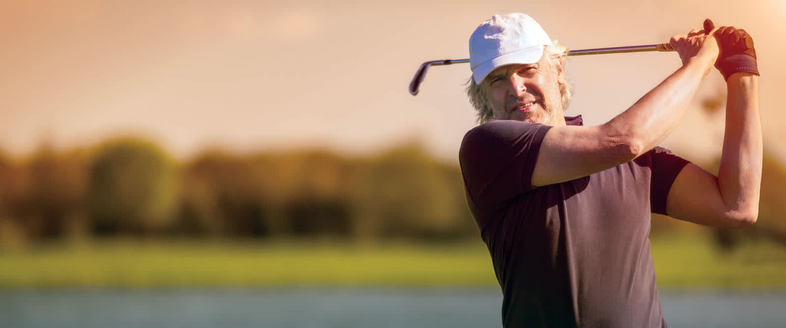 bigstock-Male-senior-golf-player-swingi-90763502