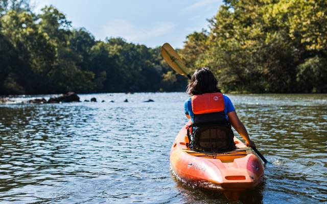 a pair of kayakers on a river