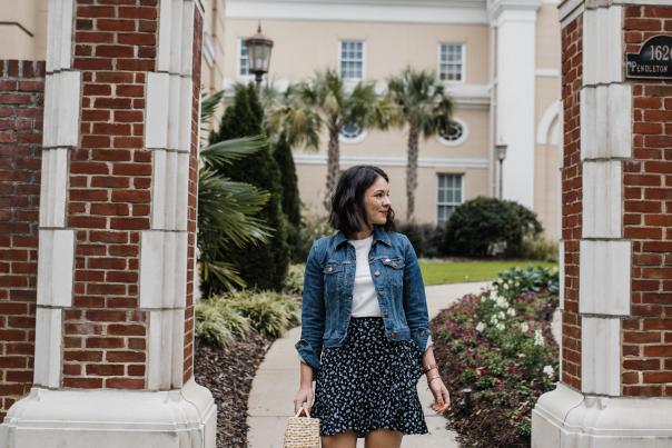 Woman walking out of Graduate hotel