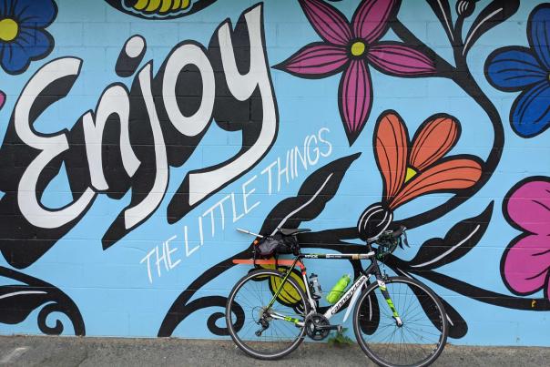 Bike in front of mural