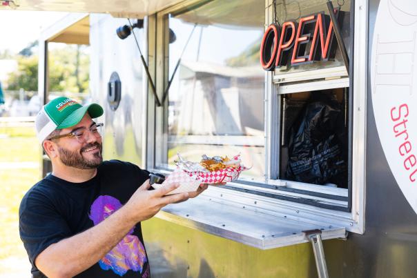 Man getting food at food truck