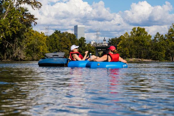 Young adults tube down the rivers in Columbia SC