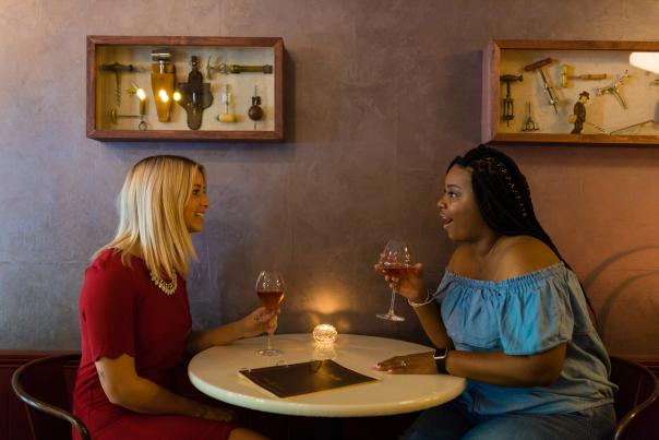 women drinking wine