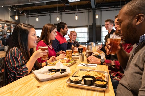 Steel Hands Brewing in Cayce, SC Friends enjoy snacks with their craft beers at Steel Hands Brewing