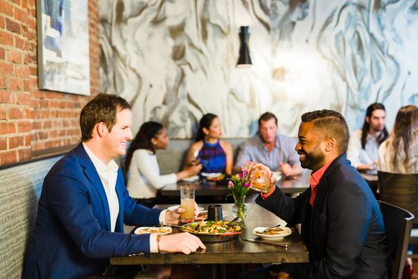 Patrons of Hendrix on Main Street enjoying food and drinks