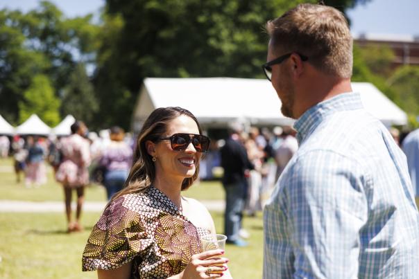 Woman and man standing at the Columbia Food and Wine Festival