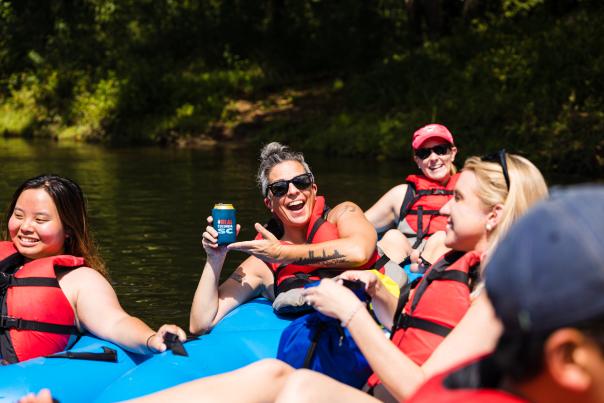 Young adults tube down the rivers in Columbia SC