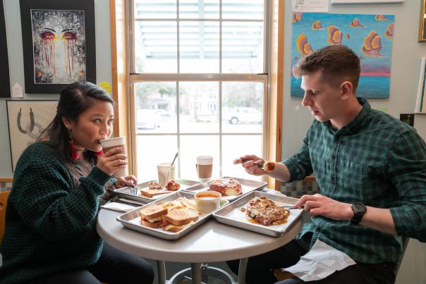 Grab an indulgent or healthy brunch at the Devine Cinnamon Roll Deli