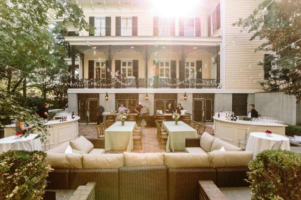 House with patio furniture set up for a wedding party