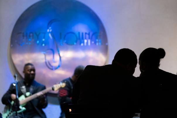 silhouette of couple with jazz band playing in the background