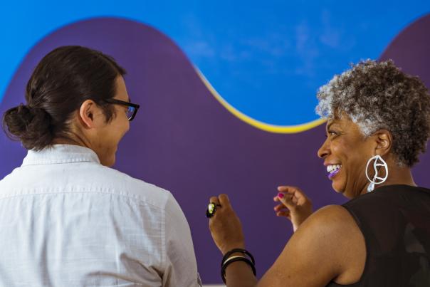 Woman shows many art at 701 Whaley Gallery