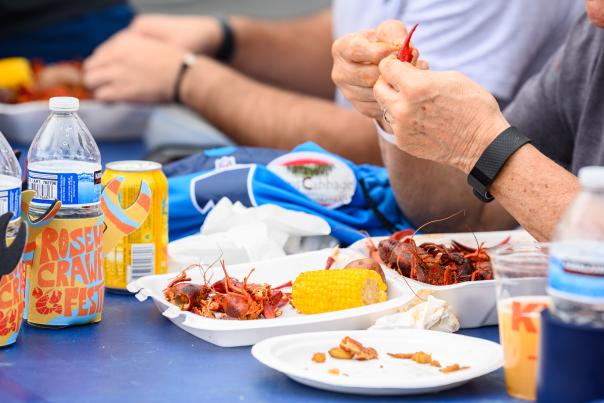 Table with crawfish and drinks
