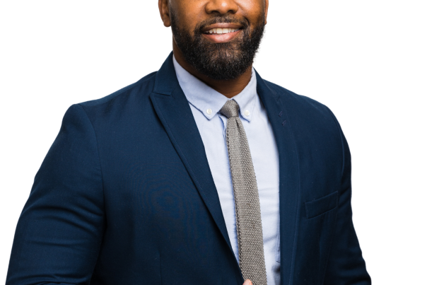 Lem Brown Headshot with city background