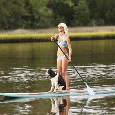 SUP lady and dog