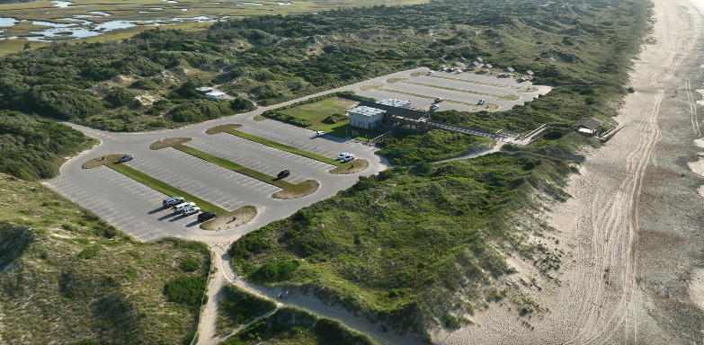 Aerial photo of Fort Macon State Park bathhouse parking lot
