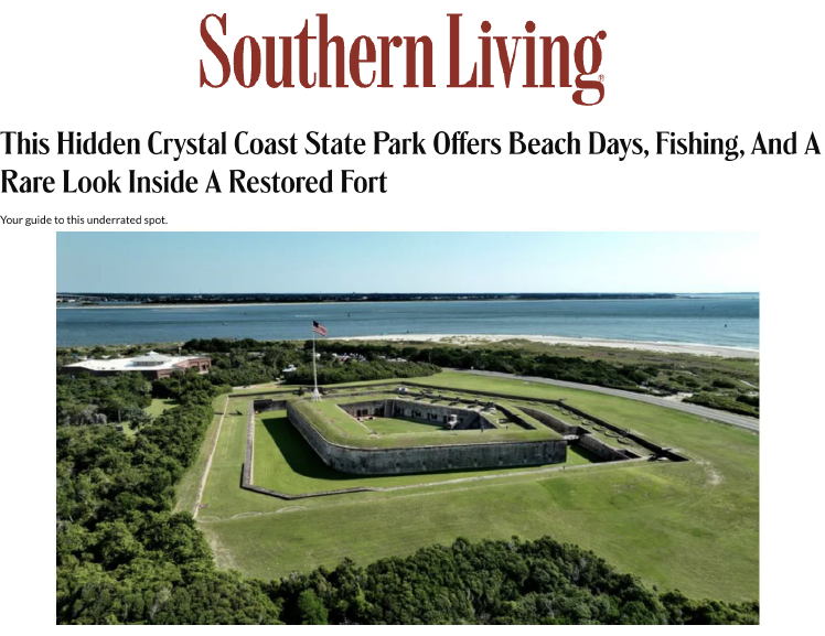 Aerial view of historic fort with the ocean in the background