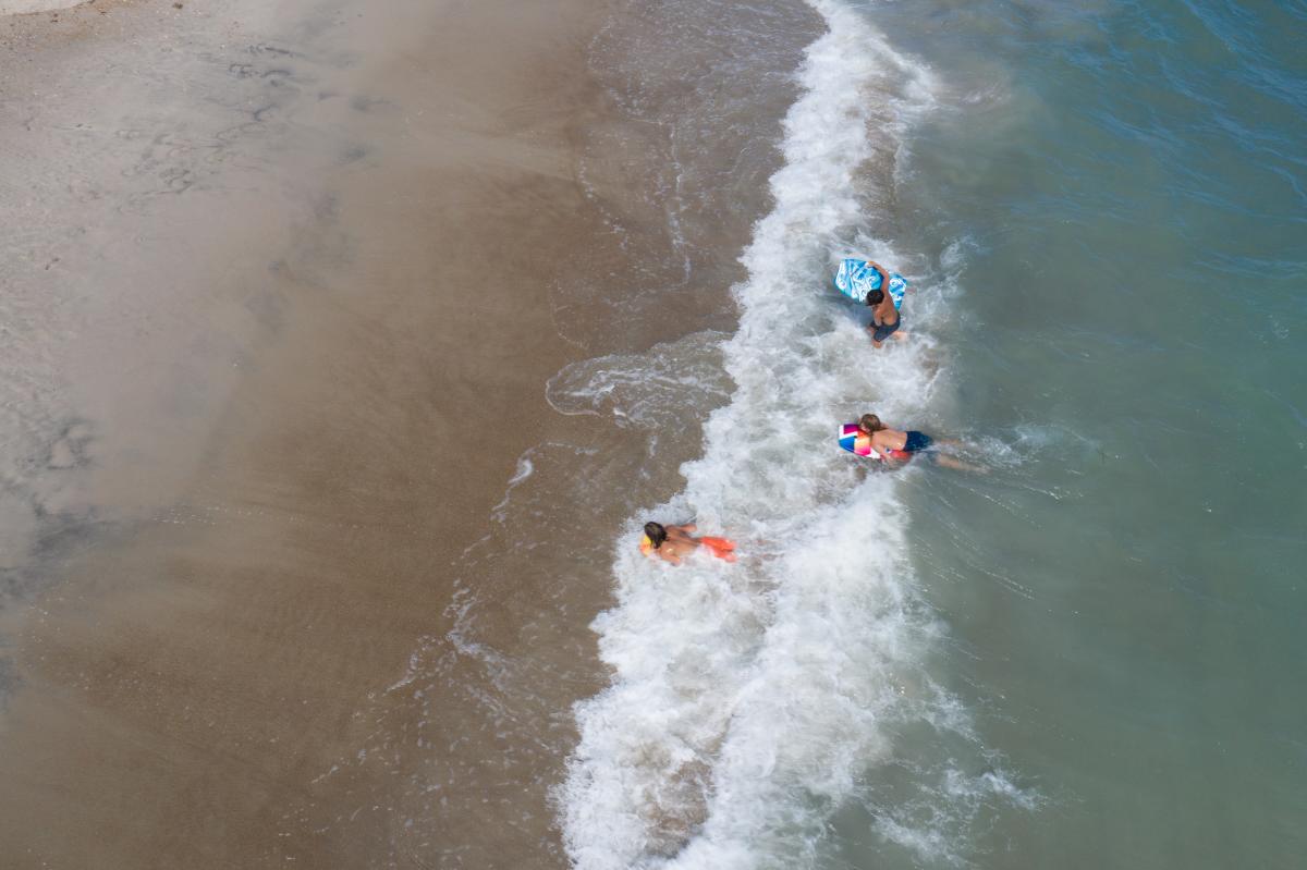 kids tubing on the waves