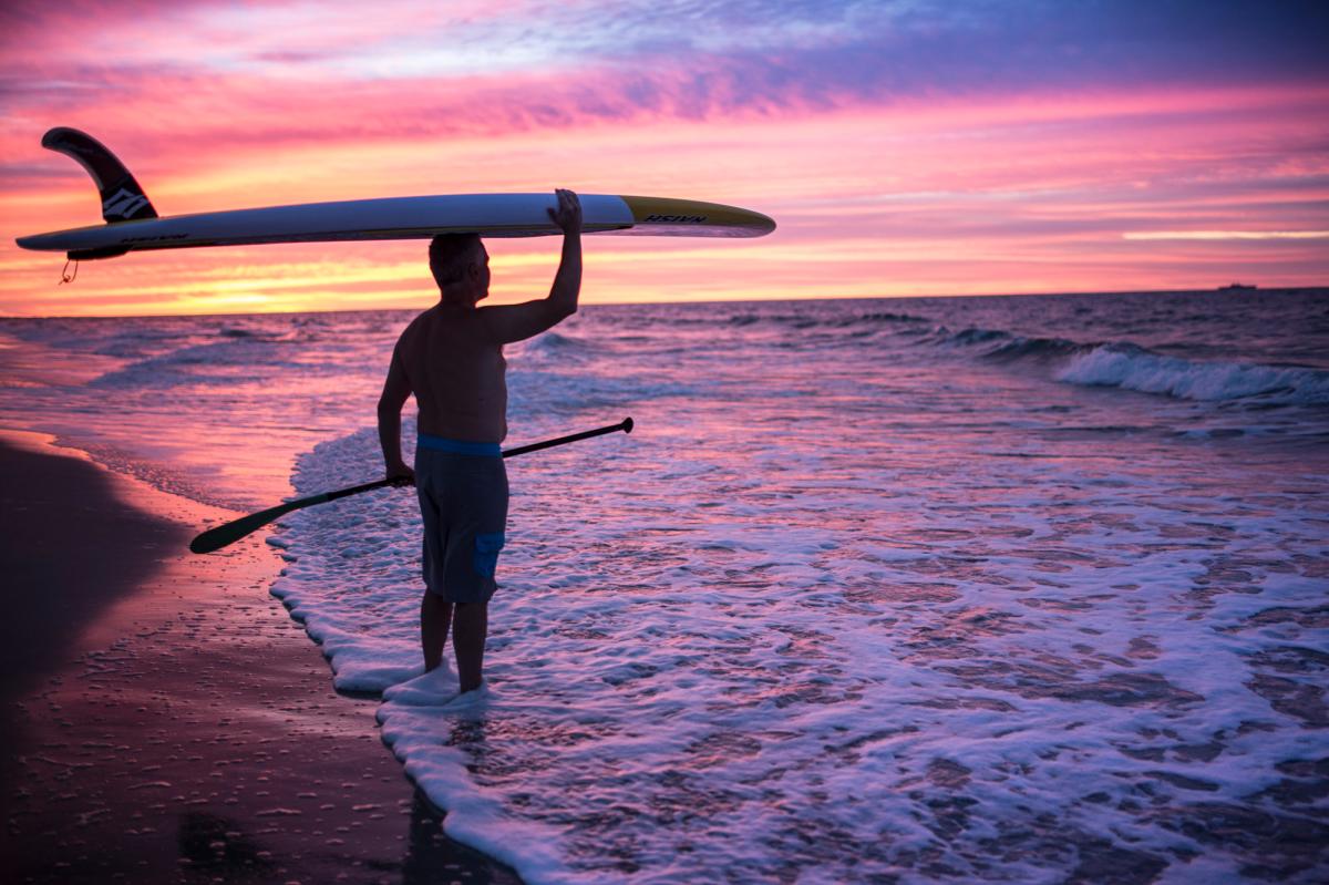 Paddleboarding at sunrise