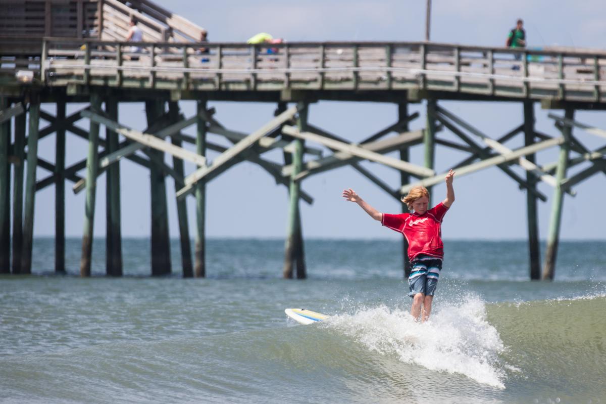 Kid Surfing Bogue Inlet Pier