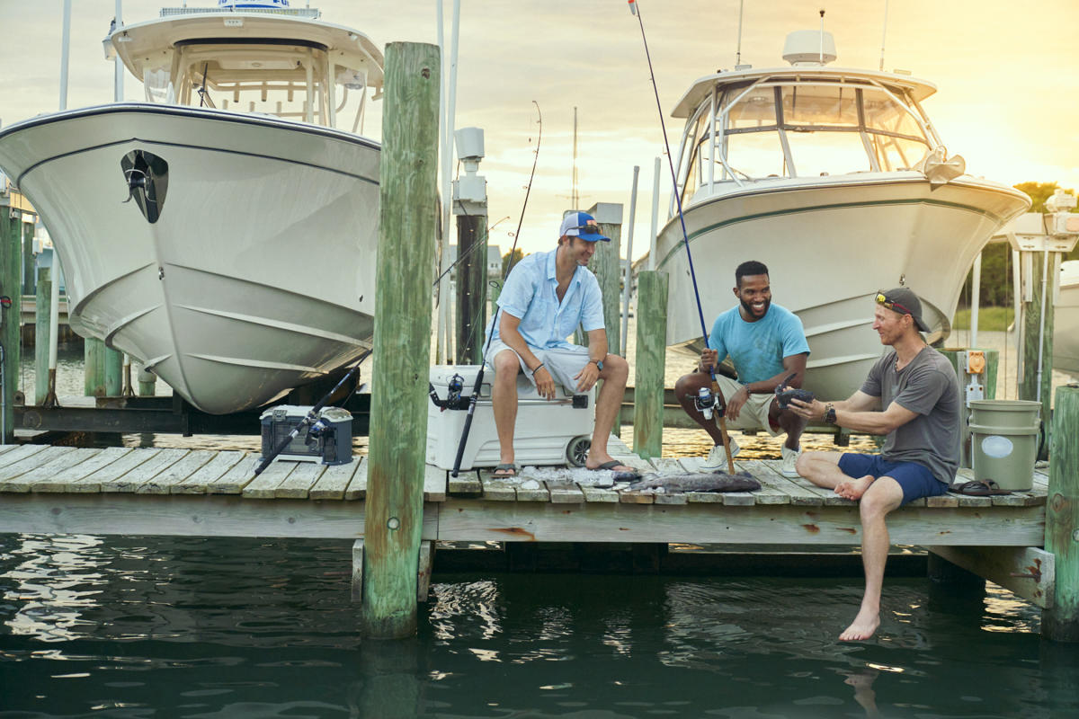 Men on dock fishing