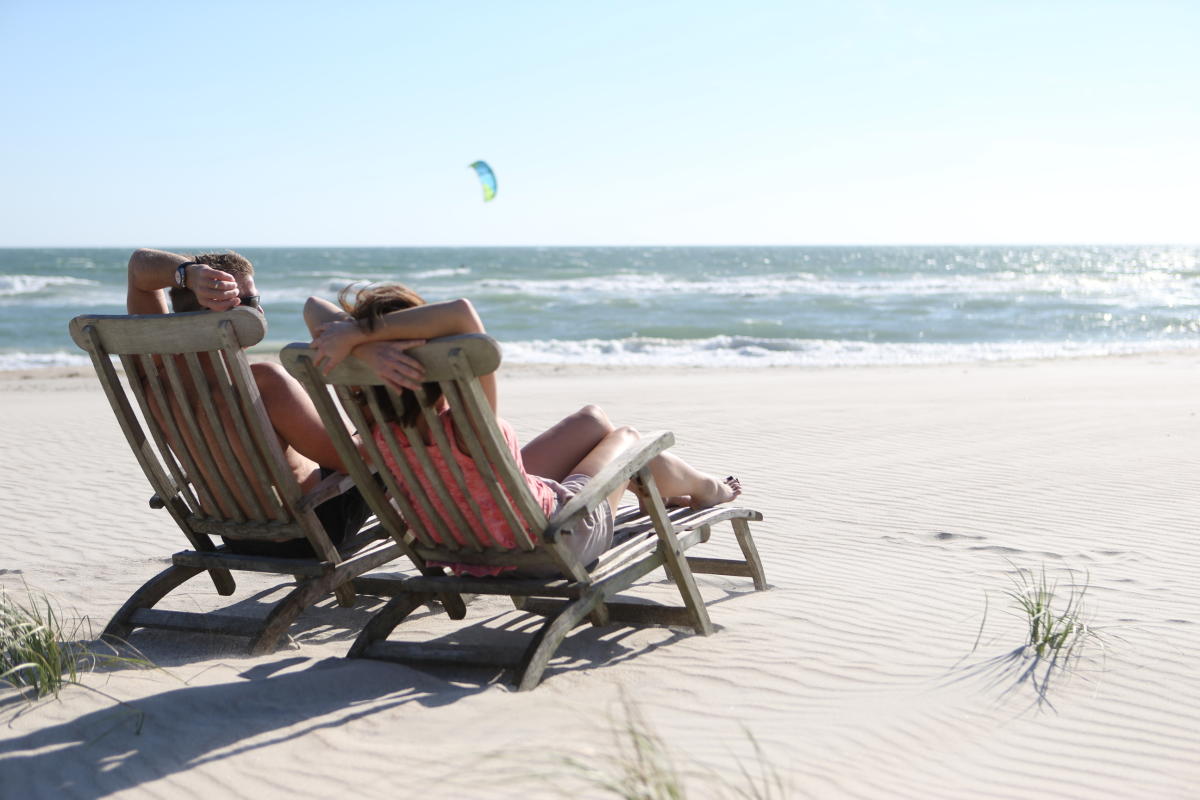 Couple in beach chairs on the beach