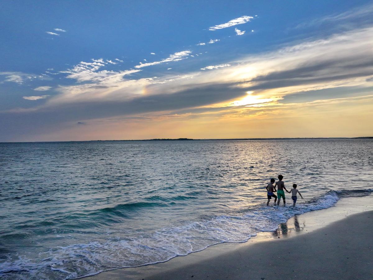 Sunset beach stroll children