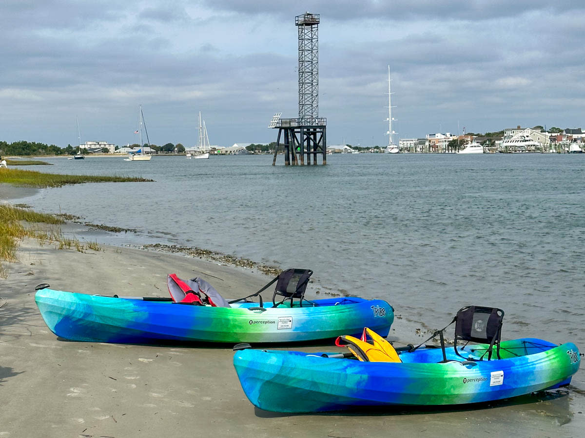 Liz Mays kayaks on shore