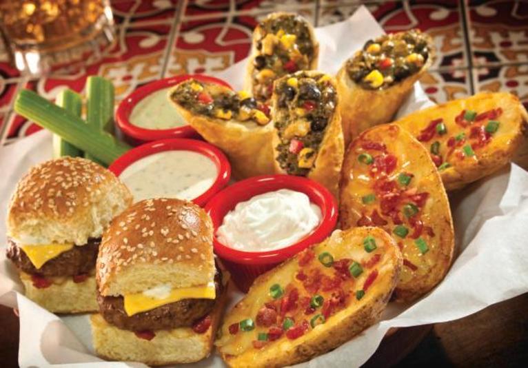 Triple dipper with Santa Fe Spring Rolls, Sliders and potato skins.