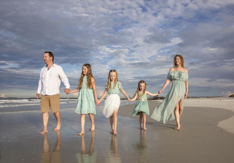 Beautiful family beach portraits by Cooper Photography