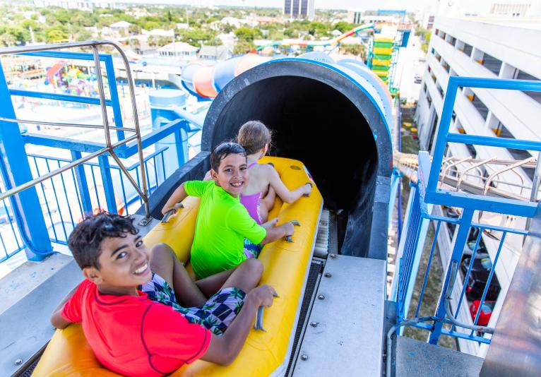 Kids going down slides