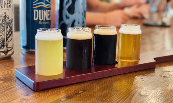Four Ales in glasses on a table