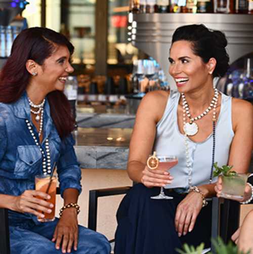 Women enjoy drinks at the Blue Flame, One Daytona