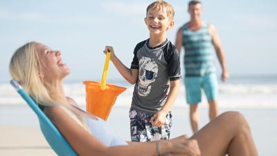 A family enjoys beach time together in Daytona Beach