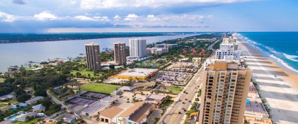 Aerial of Daytona Beach hotels with river and ocean views