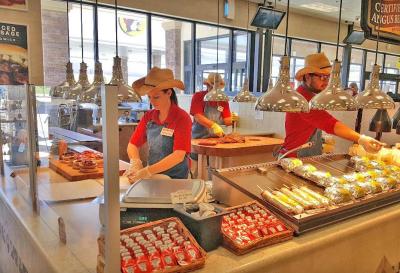 Workers preparing food in Buc-ee's Daytona Beach, FL