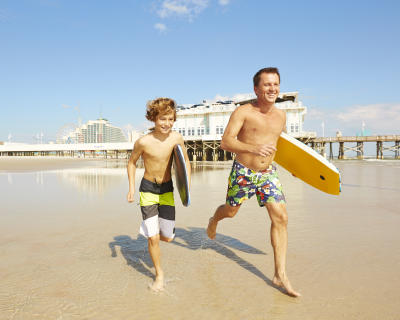 Surfing, father and son