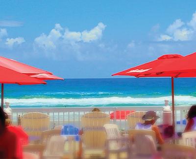 The outdoor patio at award-winning Racing's North Turn has a beautiful view and romantic vibe