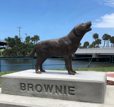 A statue of Brownie the Town Dog is perched proudly in Riverfront Park near the Sweetheart Trail in Daytona Beach