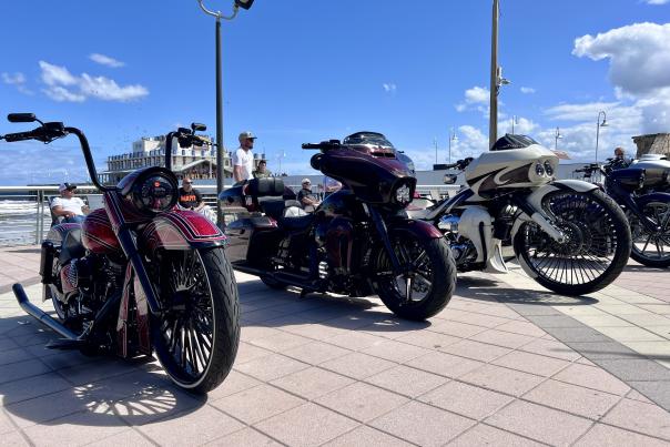 Motorcycles lined up on the Boardwalk during Biketoberfest in Daytona Beach, Florida.