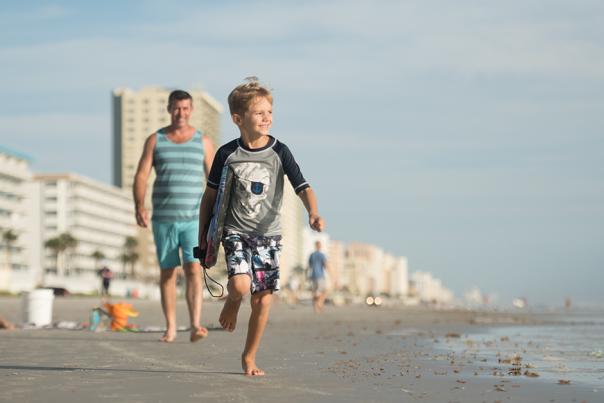 A family enjoys beach time together in Daytona Beach