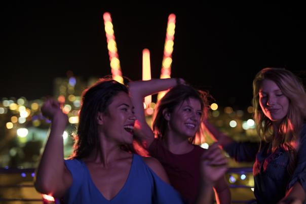 women dancing at night