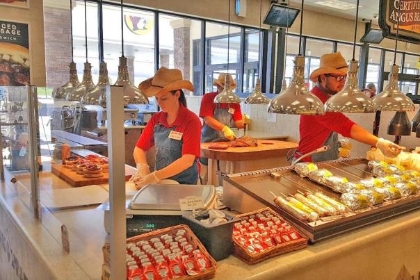 Workers preparing food in Buc-ee's Daytona Beach, FL