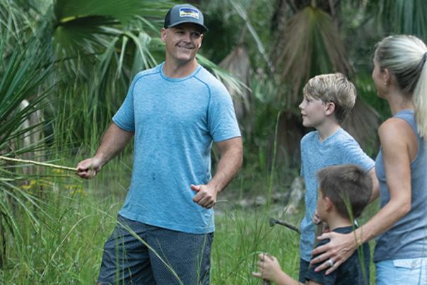 A family enjoys spending time outdoors hiking together