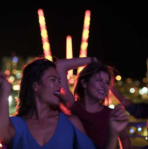 women dancing at night