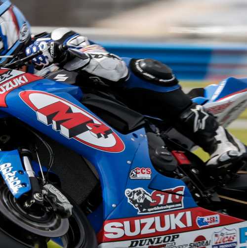 Motorcycle racer on a Suzuki at the Fall Cycle Scene during Biketoberfest in Daytona Beach, Florida.