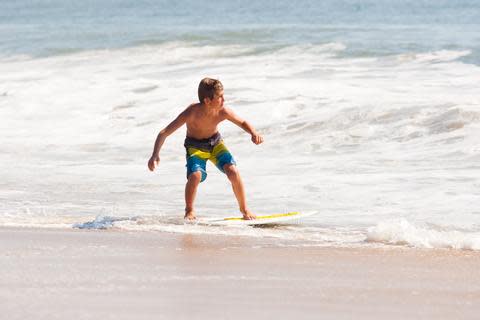 Skimboard surfing top