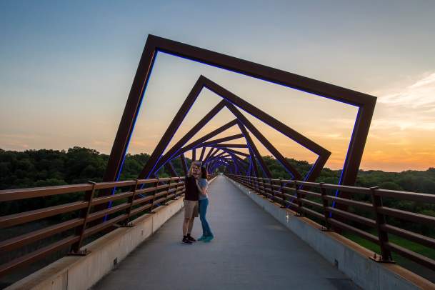 Couple Hugging on the High Trestle Trail Bridge