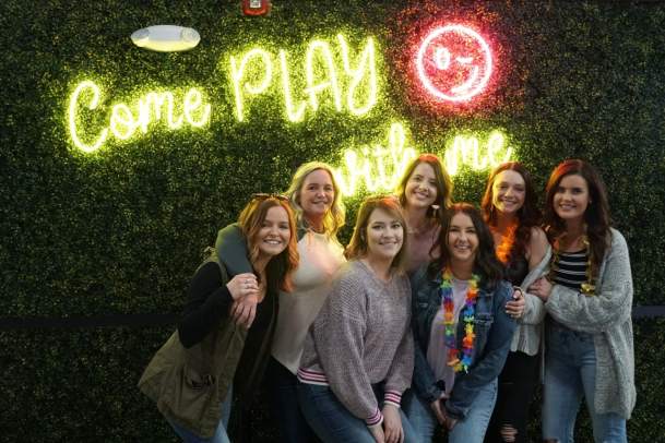 Friends Pose for Bachelorette Party at Smash Park