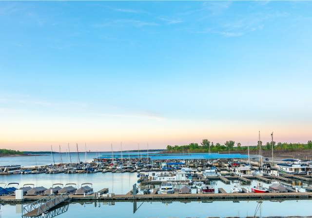 Overlook of Saylorville Lake and boats docked at the harbor